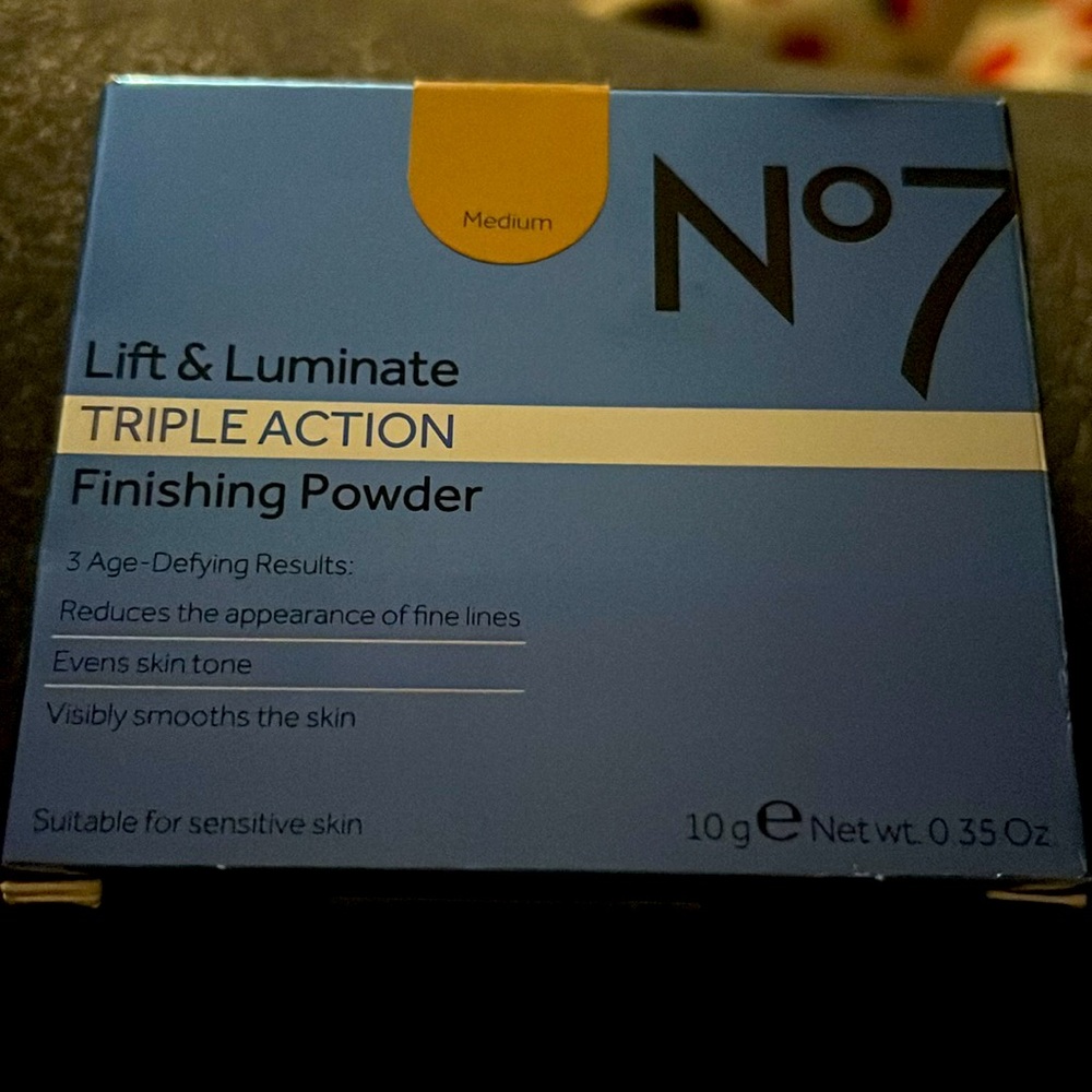 No7 Lift & Luminate Triple Action Finishing Powder in the shade Medium.